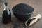 Black cumin or roman coriander seeds and black caraway oil bottle. Ayurveda natural treatments