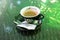 Black cup of espresso branded `Vescovi` has imprinted on the board: `il caffï¿½ ï¿½ un`arte` in a bar of Drobeta-Turnu Severin