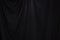 Black Curtain drape wave with studio lighting