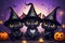 Black cute cats wear witch hats at Happy Halloween background.