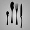 Black cutlery flat lay