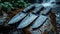 Black Damascus steel Knives on a wooden board in the rain