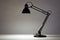 Black desk lamp on white