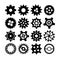 Black different silhouettes of cogwheels on white