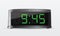 Black digital alarm clock. Vector Illustration