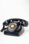 Black dirty broken old style telephone