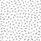 Black drawn chaotic dash geometric seamless pattern. Vector background on white background