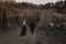 Black dressed wedding couple in rock. In love concept. Newly weds happy couple celebrating love.