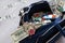 Black duffel bag full of dollar notes in criminal investigation unit, conceptual image