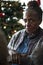 A black elderly woman in Chrismas holiday