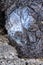 Black eruptive stone with white marks