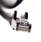 Black ethernet patch cable end connector plug macro, closeup. Rj 45, 8p8c, simple internet connection hardware, data transfer