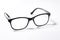 Black eye glasses spectacles with shiny black frame For reading daily life To a person with visual impairment isolaged on white