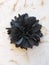 Black fabric flower