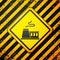 Black Factory icon isolated on yellow background. Industrial building. Warning sign. Vector