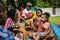 Black family enjoying summer together at backyard