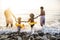 Black family having fun on the beach