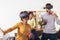 Black family at home. Dad, mom and daughter playing virtual reality