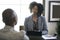 Black Female Businesswoman or Manager Arguing with Employee