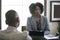 Black Female Businesswoman or Manager Arguing with Employee