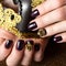 Black female manicure nails closeup with crown