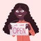 Black female small business owner or worker holding up sign We are open