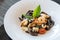 Black fettuccine with shrimp, squid and clam. Seafood squid ink pasta