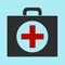 Black first aid kit on blue background