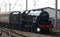 Black five steam train arriving at Carnforth