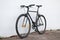 Black fixed-gear bicycle