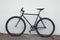 Black fixed-gear bicycle