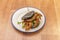 Black flour bao with crab meat battered in tempura