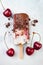 Black Forest chocolate fudge popsicles with roasted cherries and coconut cream. Vegan creamy ice pops, nicecream, fudgesicles.