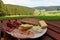 Black Forest hamand and cheese snack with bread with the beautiful view over a valley in the Black Forest, Germany