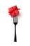 Black fork and red gift box on white background Holidays concept