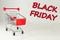 Black Friday 2021. Design for Black Friday accompanied by a metal shopping cart for the huge sales on these dates.