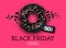 Black friday big sale poster with black sweet donuts on pink background