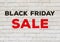 Black Friday sale banner, text on white bricks