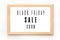 Black Friday sale poster in wooden frame hanging on the wall. Vector illustration