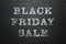 Black Friday Sale written on dark chalkboard