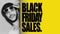 Black Friday Sales text on yellow background, against black and white portrait of happy guy with sunglasses.