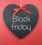 Black Friday shopping sale concept with message on a heart shape blackboard