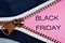 Black Friday sign in zipper-shop sale of goods at a reduced price.Custom shopping-the opportunity to have time to buy a gift in