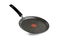 Black frying pan isolated on white background. Frying pan with non-stick coating and red temperature indicator. Isolate