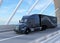 Black Fuel Cell Powered American Truck driving on highway