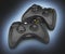 Black gamepads multiplayer games illustration on blue and black gradient background 3d