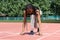 Black girl athlete getting ready for running to fix new record or daily outdoor cardio workout