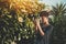 Black girl in garden with vintage cam