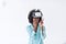 Black girl using VR headset glasses of virtual reality