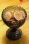 Black Glass Bowl Filled with Rye Chips